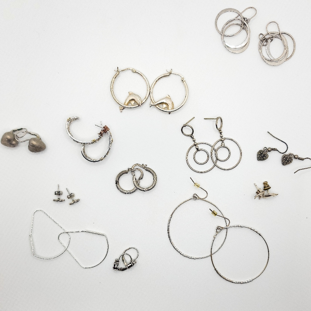 12 Pairs of Sterling Silver Earrings